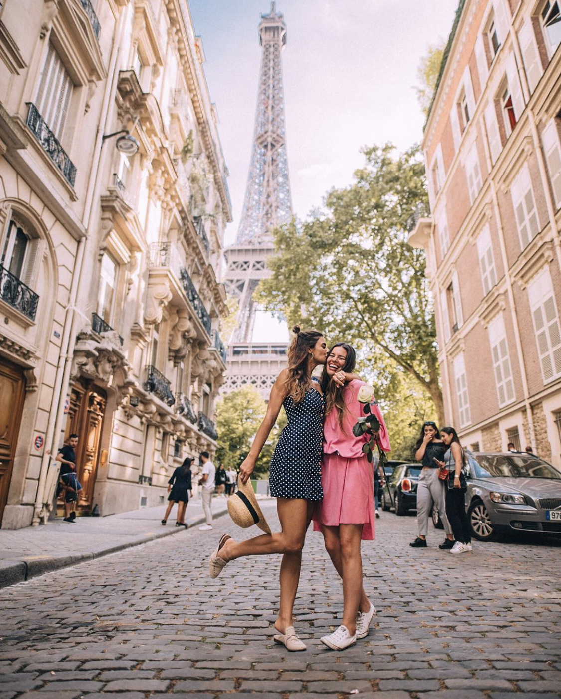 Lisa Homsy and Mel Vandersluis in Paris at the Eiffel Tower