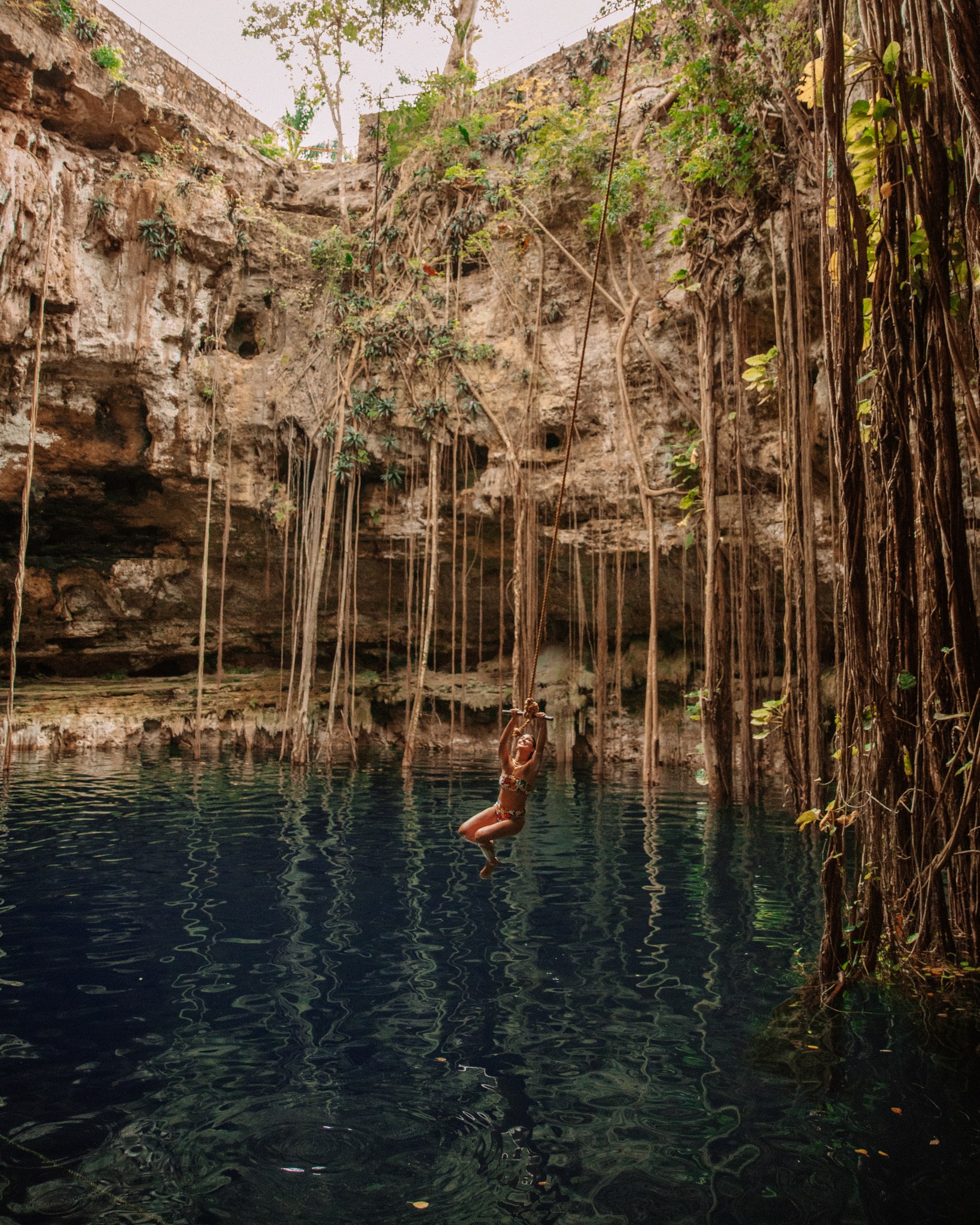 https://lisahomsy.com/wp-content/uploads/2021/04/Best-cenotes-around-Tulum-Cenote-Oxman-3-6084-1638x2048.jpg