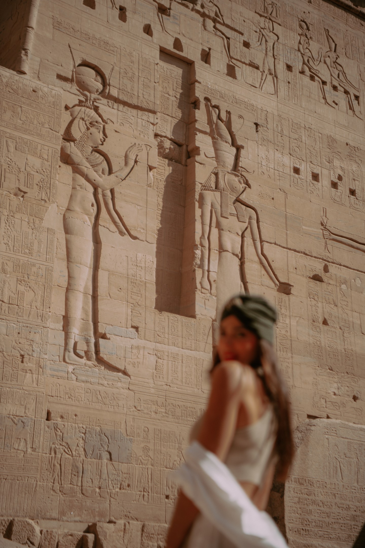 Lisa Homsy with hieroglyphics at Philae Temple, Aswan