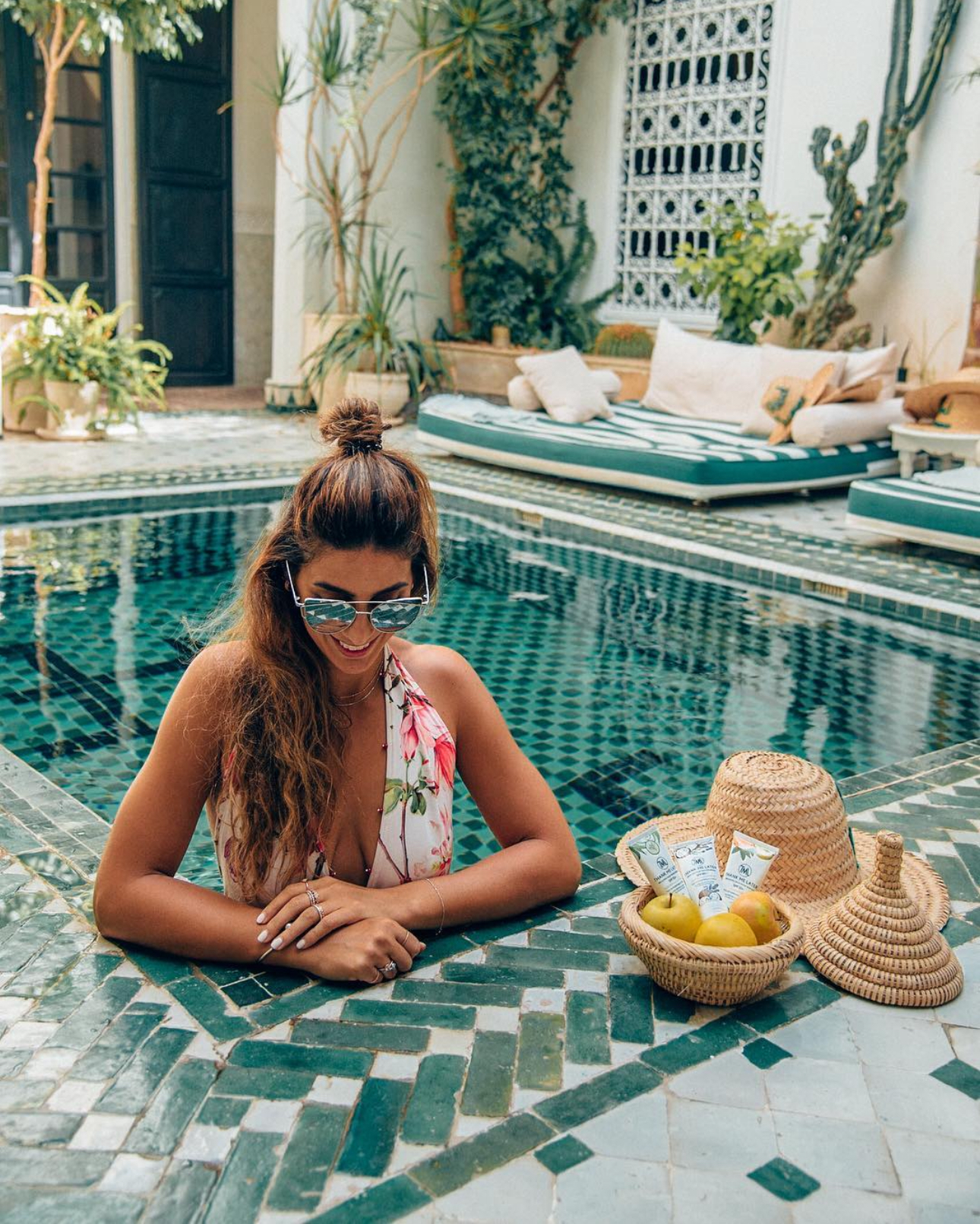 Girl enjoying the pool at Riad Yasmin in Marrakech, Morocco