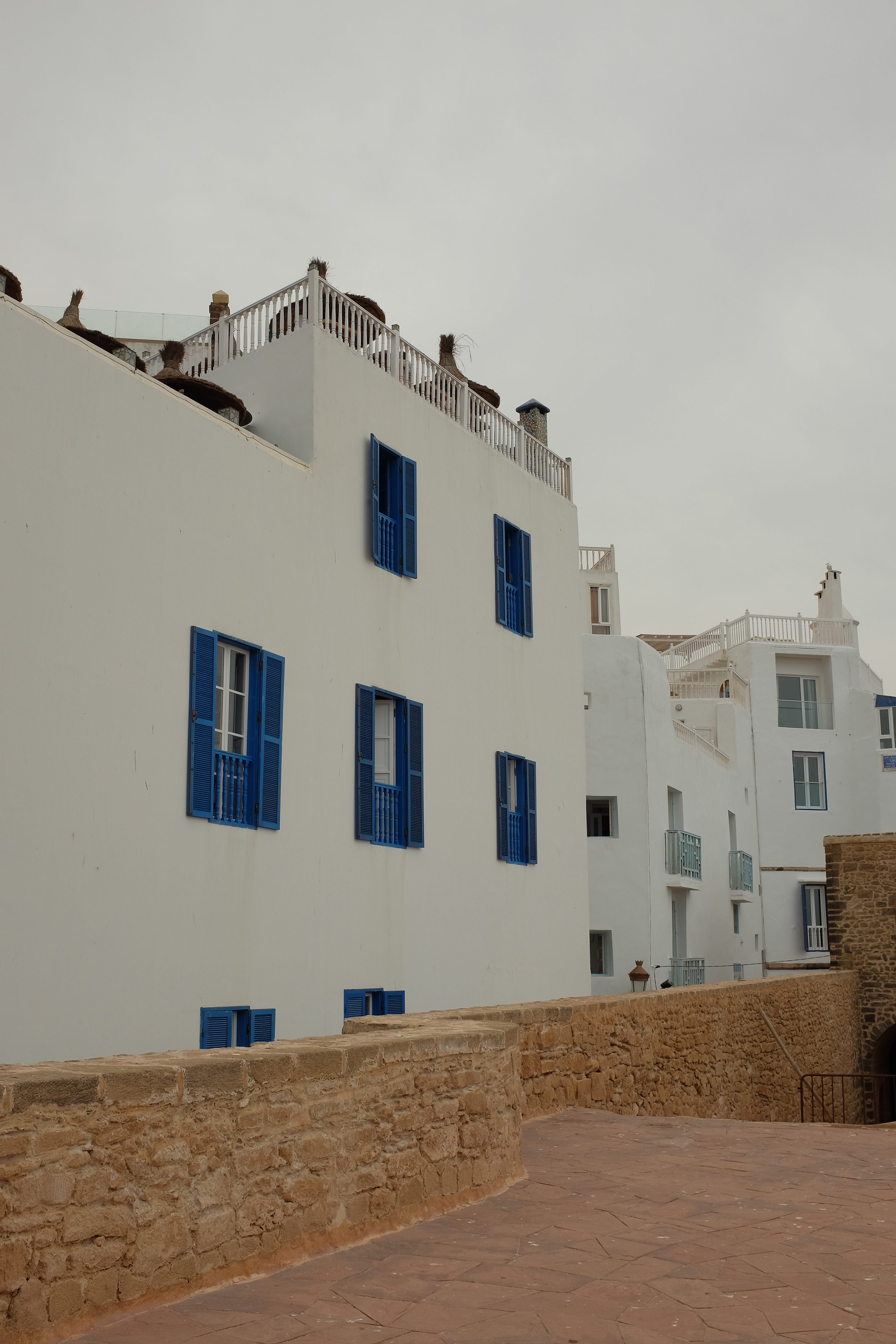 Essaouira looks like Greece with white coloured buildings with blue shutters