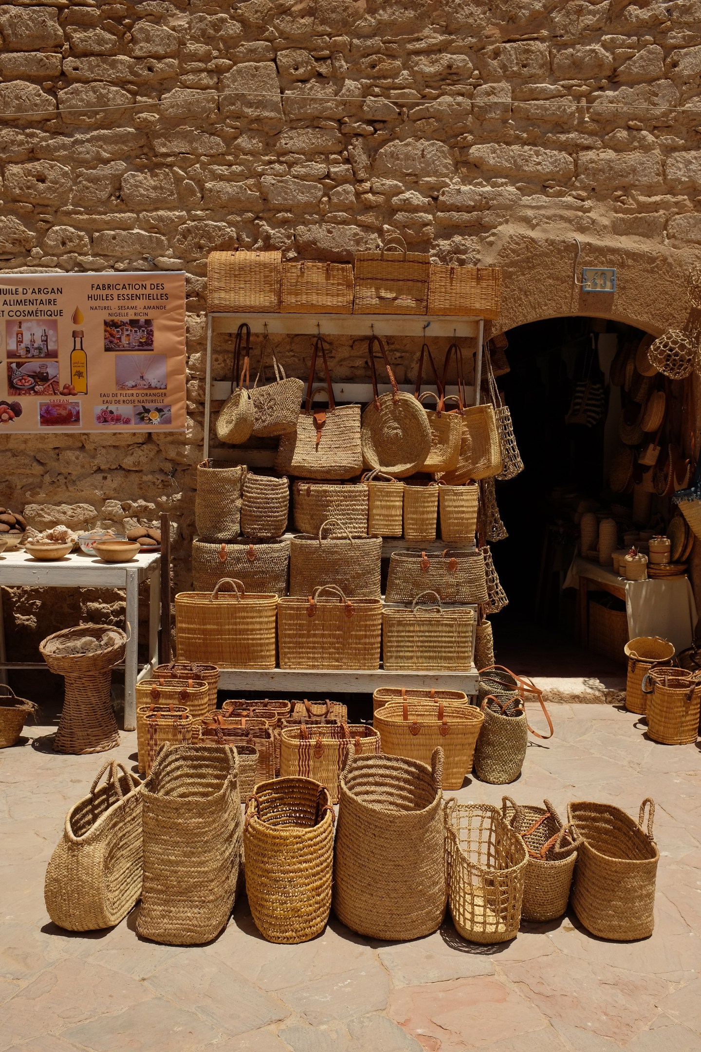 Local vendor selling all different wicker bags